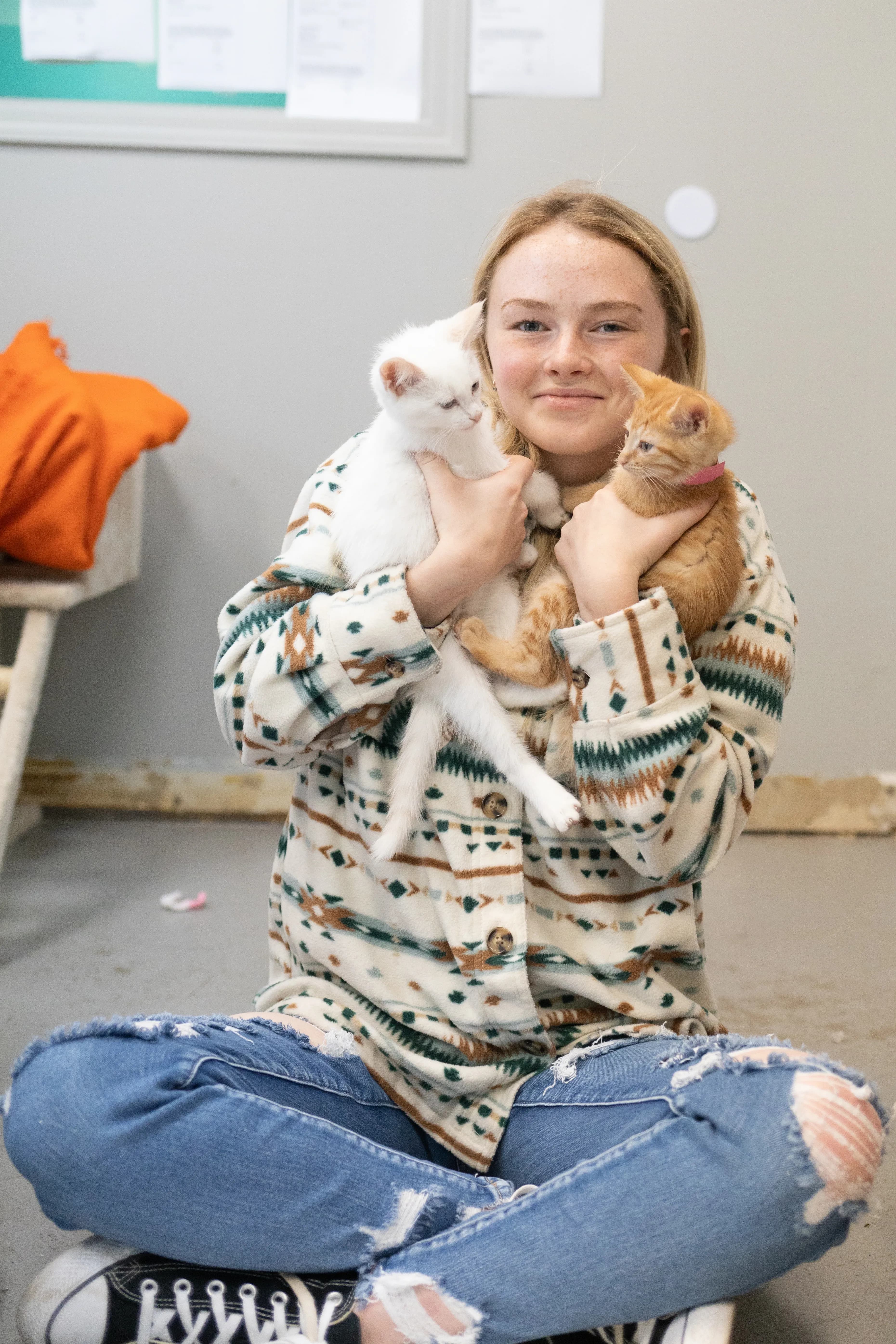 Volunteer Holding Kittens